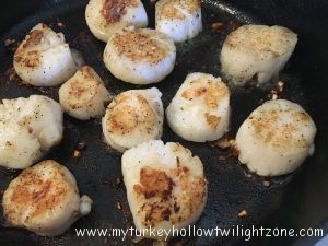 pan seared scallops with fresh lettuce greens