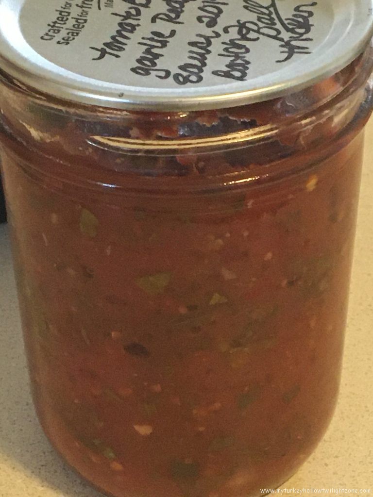 Home canned tomato basil with garlic and cayanne flakes and herbs